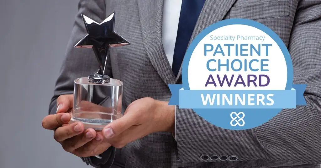 close-up-of-businessman-holding-star-award-with-mmit-patient-choice-awards-winners-medallion-overlay