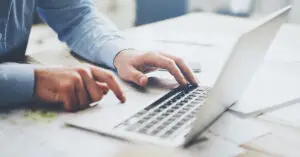 close-up-person-laptop-looking-at-ndc-codes