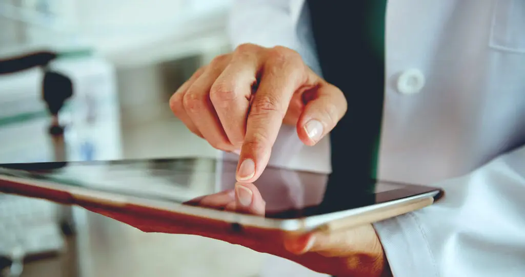 Doctor-touching-tablet
